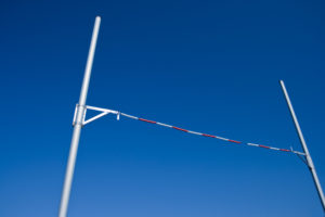 Image of a high jump bar set high